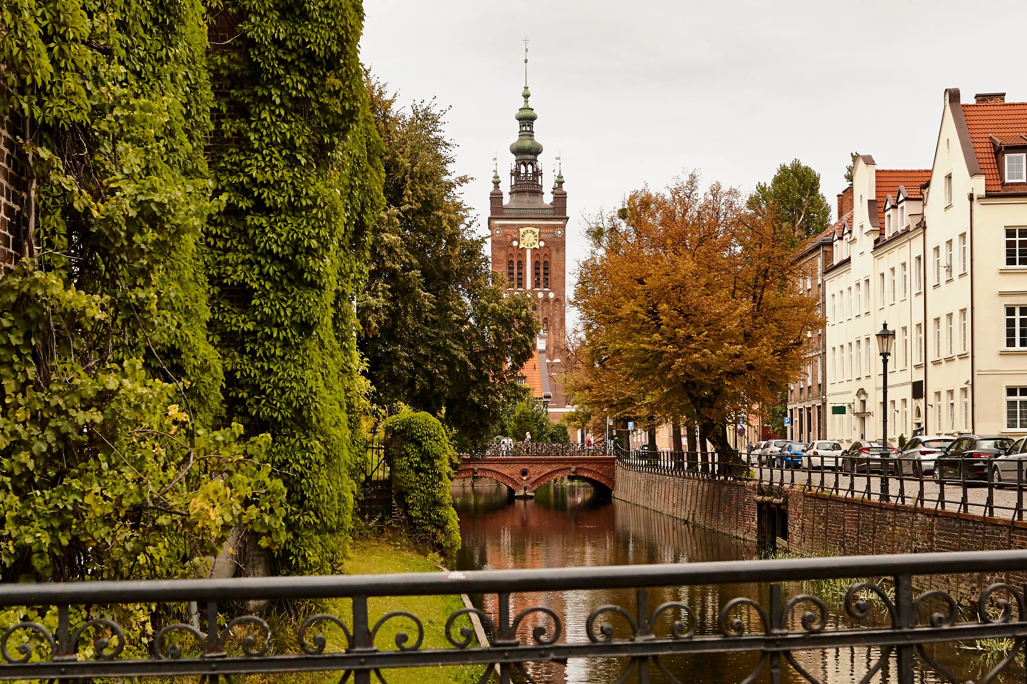 Gdańsk old town canal with St. Catherine's Church